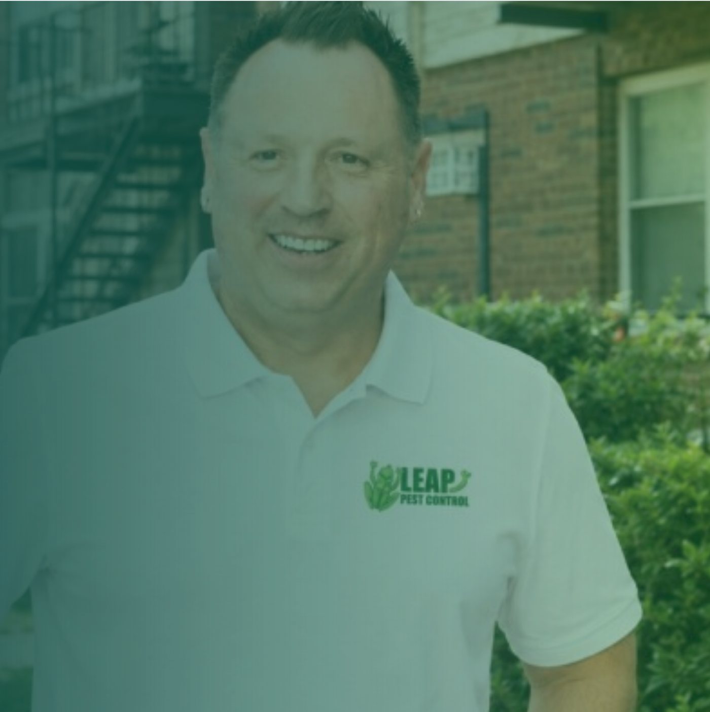 Carl Maroney, founder of Leap Pest Control, in a Leap Pest Control shirt